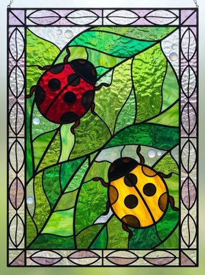 Finished example of the Color by Number page: Ladybugs